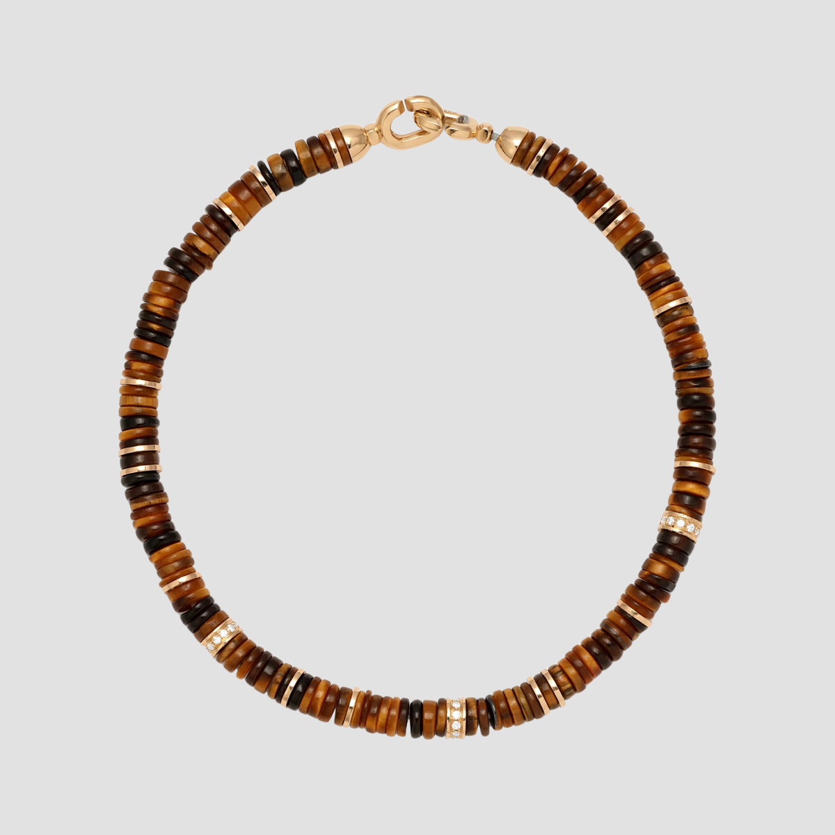 Pulsera Shine de 4 mm con detalle pavé, ojo de tigre y oro amarillo