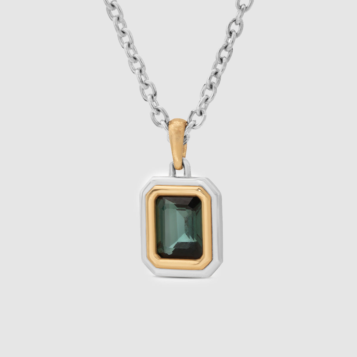 Equinox Charm Necklace in Silver and Yellow Gold Trim with Blue Topaz